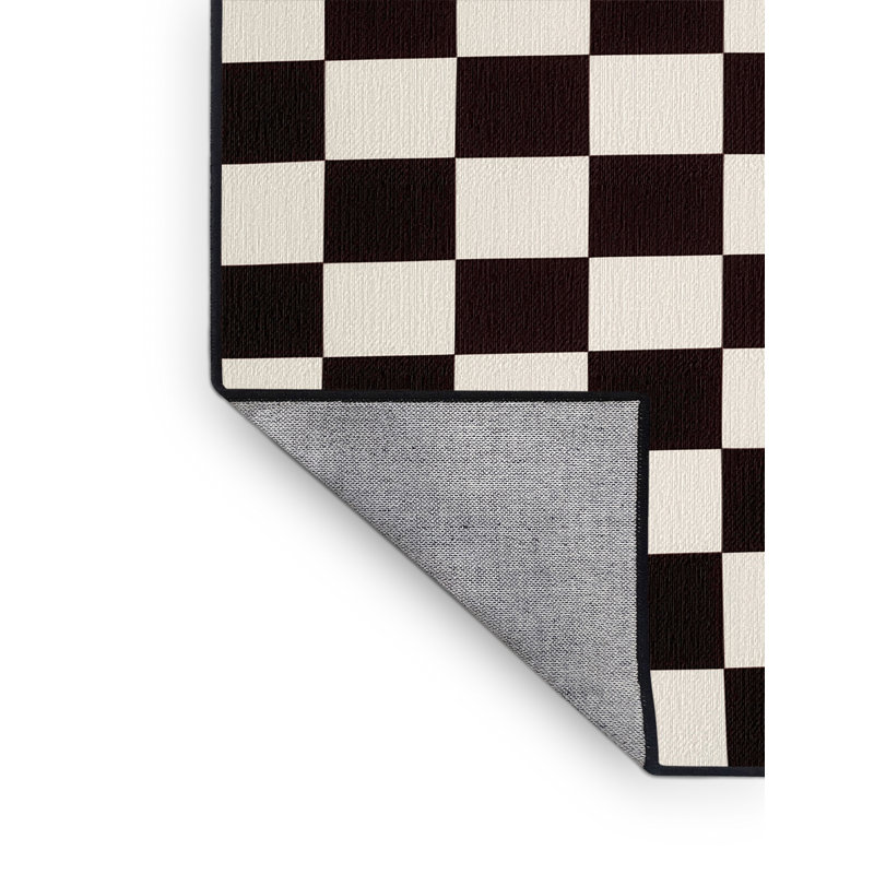Tapis damier noir lavable à la machine