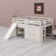 Un lit mezzanine avec glissade et rangement intégrés structure une chambre d'enfant moderne et minimaliste et s'harmonise avec un décor aux lignes épurées.-134703501