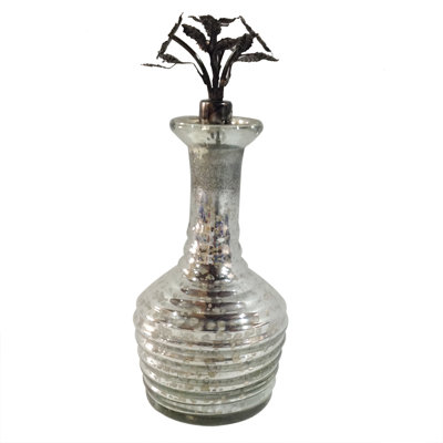 Bouteille de parfum en verre et en fer