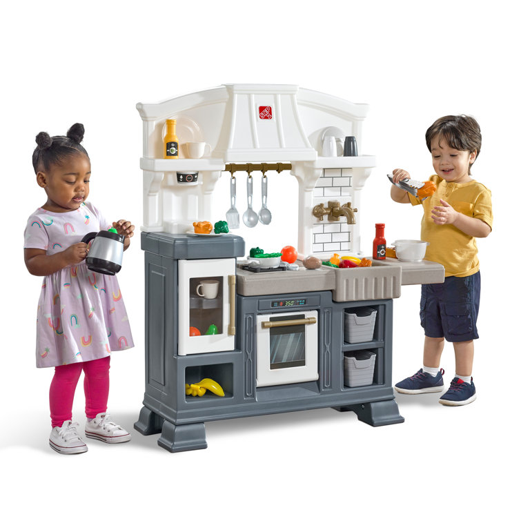 https://assets.wfcdn.com/im/47522009/resize-h755-w755%5Ecompr-r85/2441/244196859/Step2+Gilded+Gourmet+Kitchen+Playset+For+Kids+Includes+20+Plus+Toy+Kitchen+Accessories+Interactive+Features+For+Realistic+Pretend+Play+White+Blue+Gray+Modern+Farmhouse+Style+Play+Kitchen.jpg