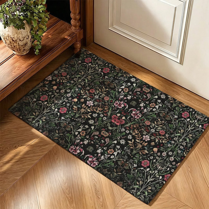 Tapis à motif floral discret sur fond sombre, 119 x 79 cm