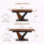 Table de salle à manger extensible moderne avec placage en bois et base en croix
