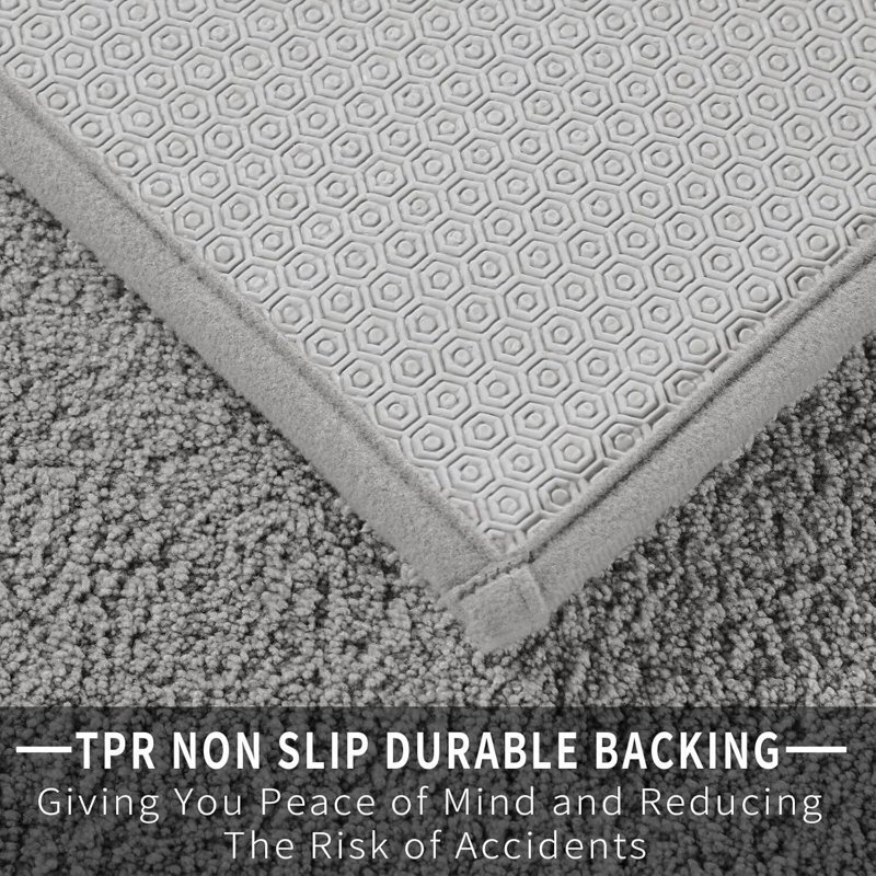 Tapis gris antidérapant pour salle de bain