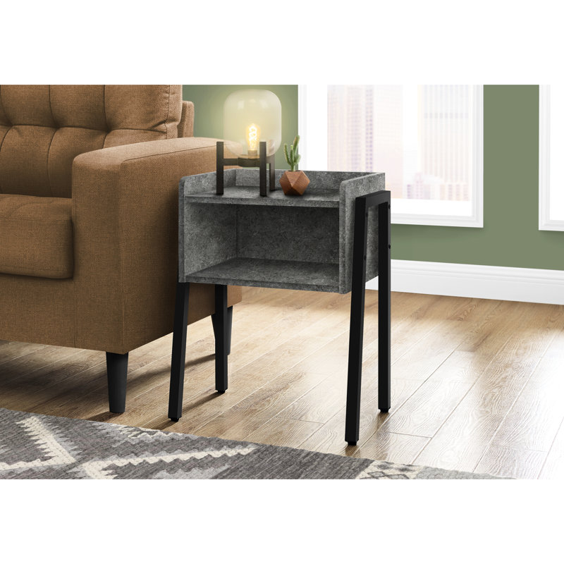 Table de bout contemporaine avec aspect de pierre et pieds en métal noirs robustes