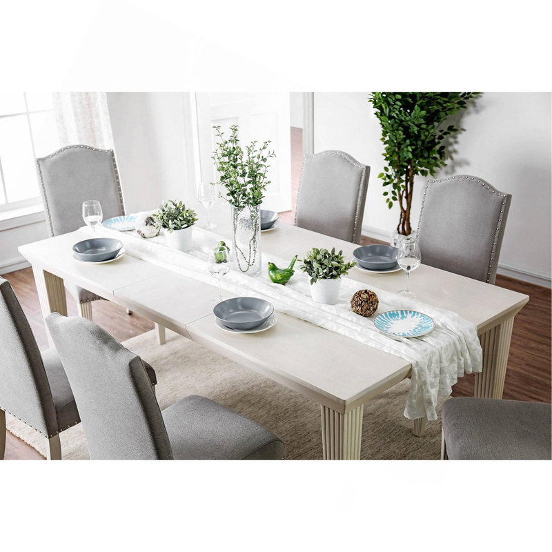 Elegant Rectangular Dining Table With Expandable Leaf In Antique White Finish