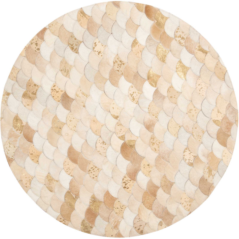 Tapis de zone beige rond géométrique vache Montecello