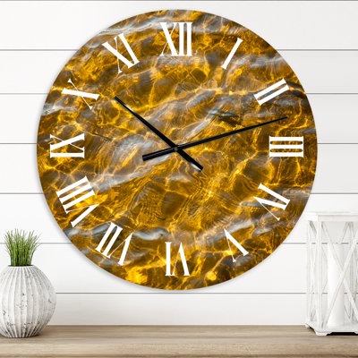 Reflet de l'eau de mer sur le plancher de sable - horloge murale moderne