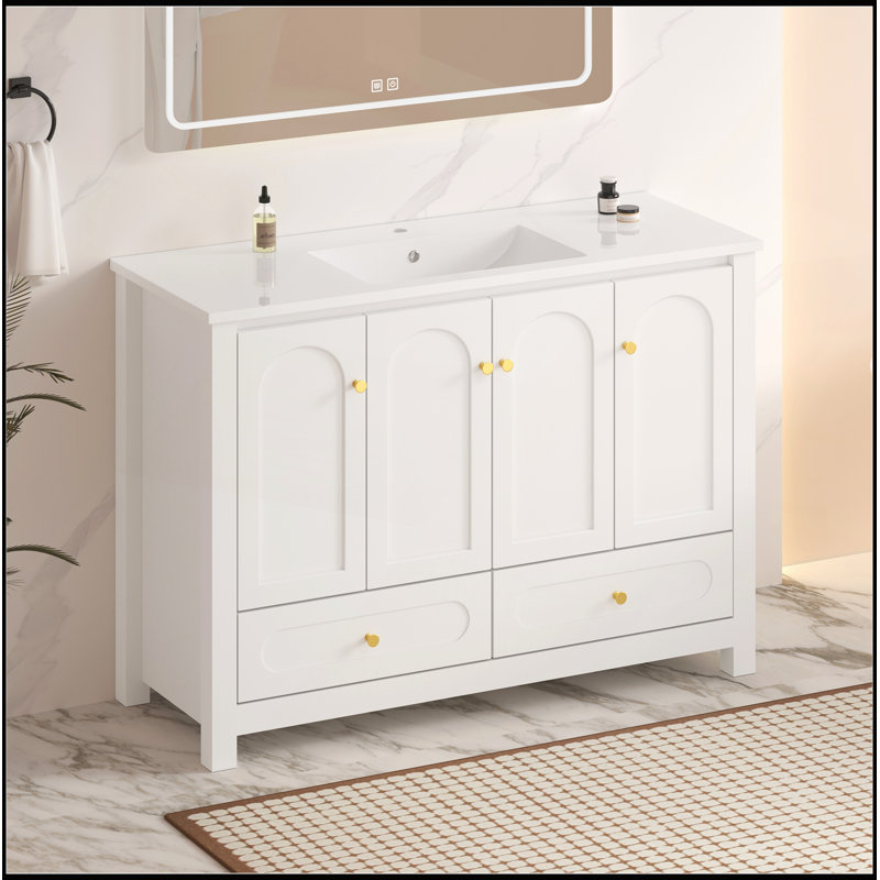 Meuble-lavabo blanc 48 po avec lavabo en résine et rangement abondant, portes et tiroirs à fermeture en douceur pour une élégance moderne