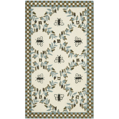 Hollander Floral Handmade Tufted Wool Ivory Area Rug