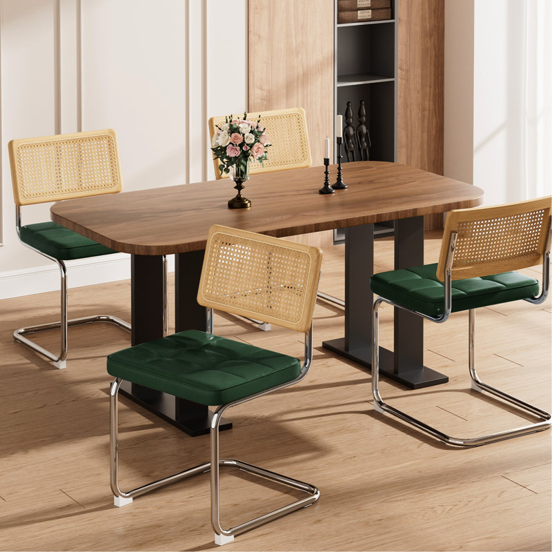 Chaises de salle à manger polyvalentes en similicuir vert de conception moderne pour des espaces élégants