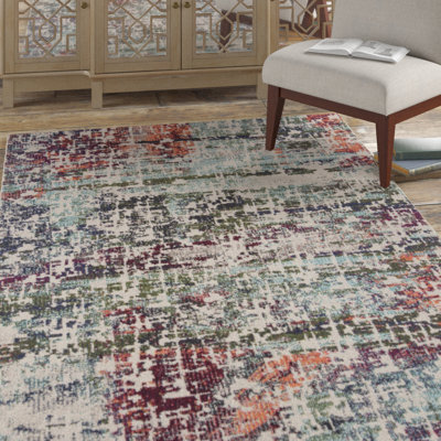 Felty Abstract Blue/Green/Orange Area Rug