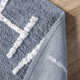 Alphabet SpinCleanhable Rug