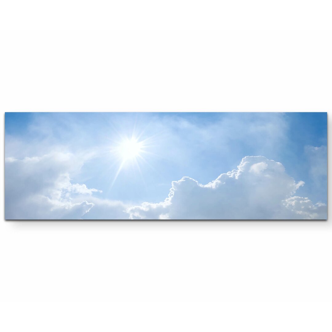 Leinwandbild Blauer Himmel mit Wolken und Sonne