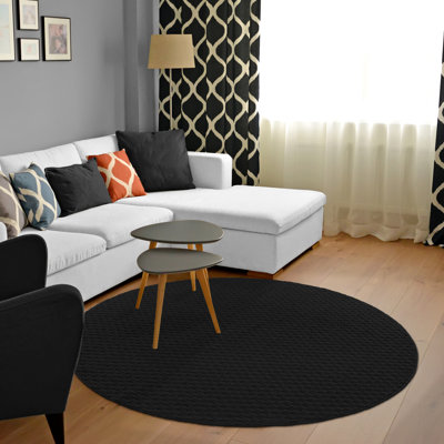 Tapis noir touffeté