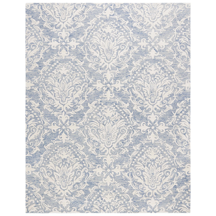Ferrera Ikat Handmade Tufted Wool Blue / Ivory Area Rug