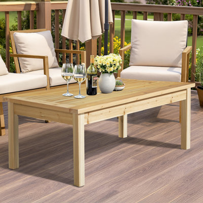Table de patio en bois brun clair