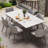 Relja 62.9" To 94.4" Expandable White Sintered Stone Dining Table