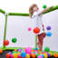 Trampoline hexagonale pour enfants avec enceinte sécuritaire-128767197