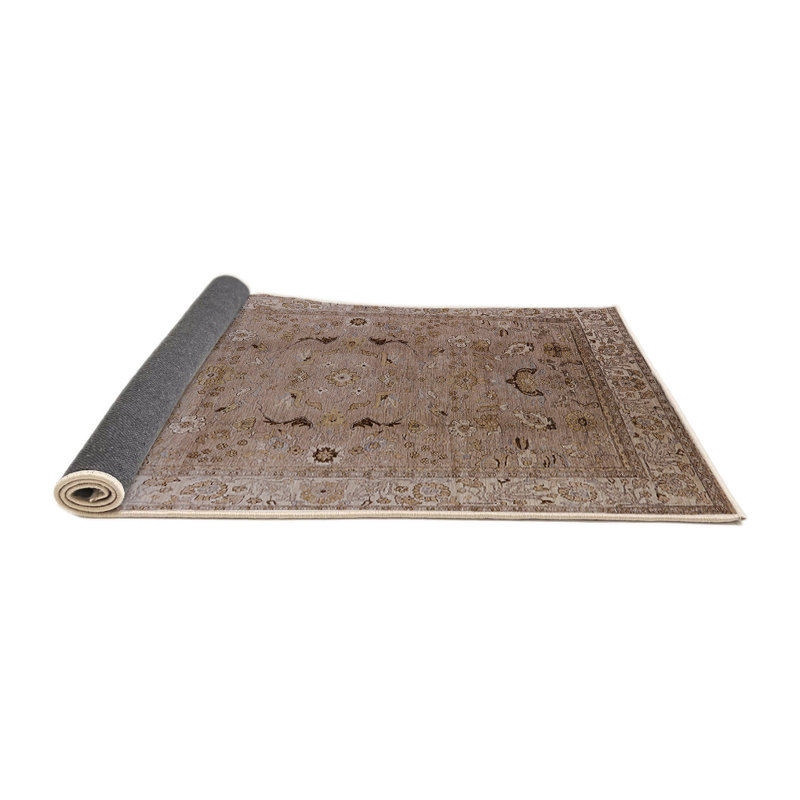 Tapis brun Halvorson, Rond 6 pi