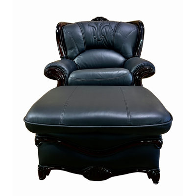 Fauteuil et repose-pieds en cuir véritable