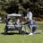 Jeep Wrangler Deluxe 4 Seater Stroller Wagon by Delta Children - Premium Stroller Wagon for 4 Kids with Convertible Seats, Adjustable Push/Pull Handles, Removable Canopy & Flat Fold