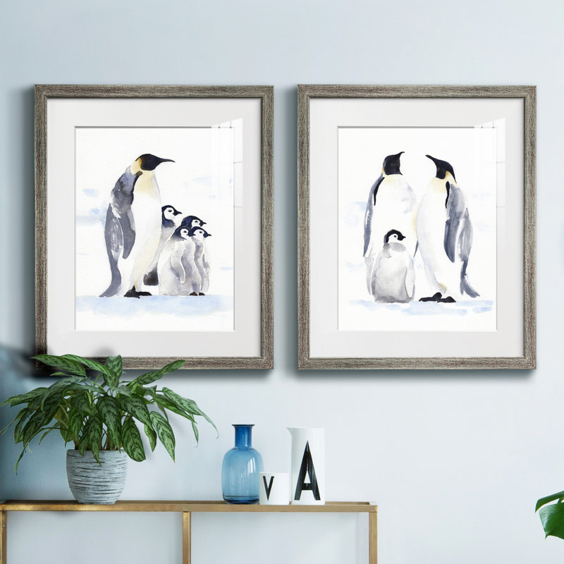 «Emperor Penguins I», ensemble de 2 reproductions d'art sur toile encadrées