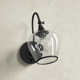 Larkson Single Light Glass Dimmable Armed Sconce