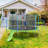 Trampoline with Slide and Swings with Basketball Hoop and Ladder with Net