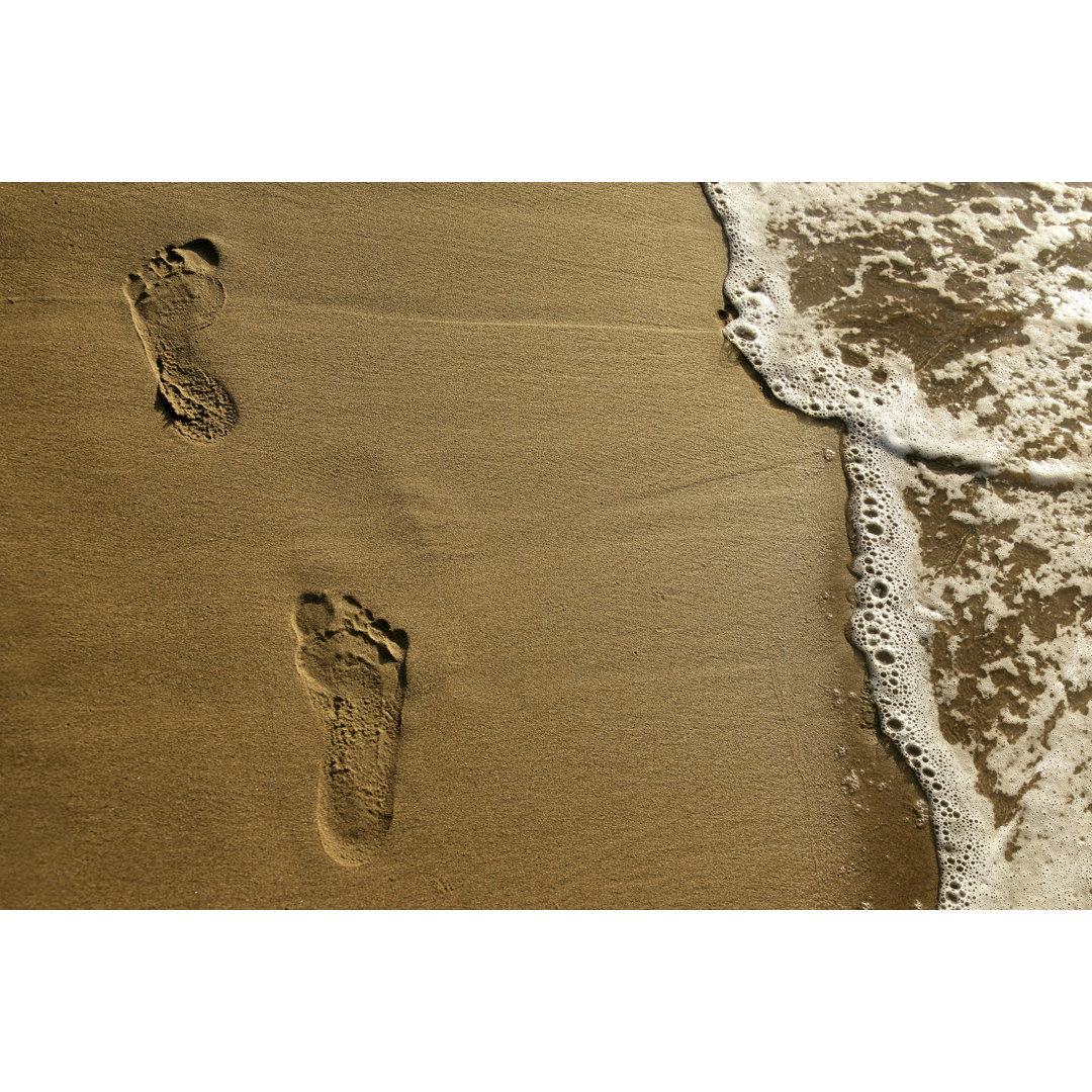 Fußabdrücke am Strand von Imagedepotpro - Leinwandbild