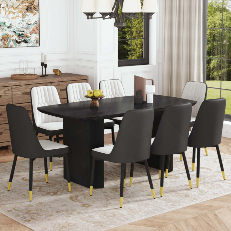 Table de salle à manger spacieuse en bois aggloméré avec 8 chaises ergonomiques, idéale pour un décor moderne et luxueux.