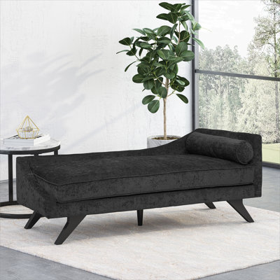 Chaise longue rembourrée avec petit coussin décoratif