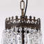 Maquisha Dimmable 12-light Empire Tiered Crystal Chandelier with Antique Bronze Accents