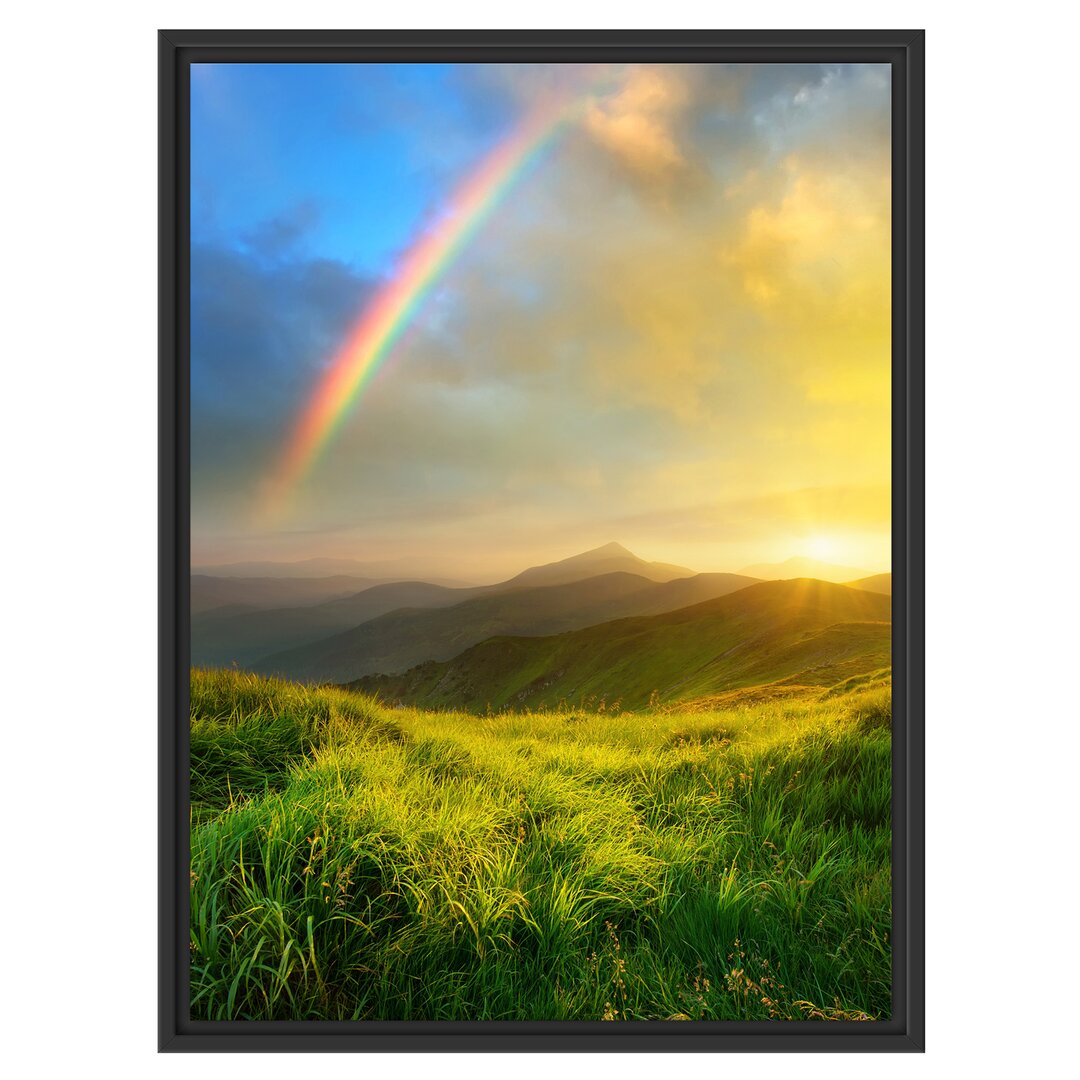 Gerahmtes Wandbild Berge mit Regenbogen am Himmel