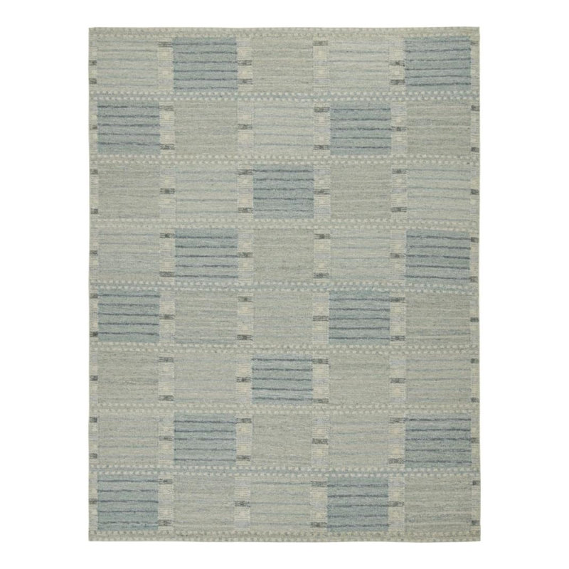 Rug & Kilim’s Custom Scandinavian Rug with Blue Geometric Patterns