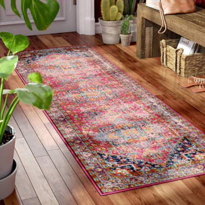 Tapis fuchsia à motif oriental Ashburn