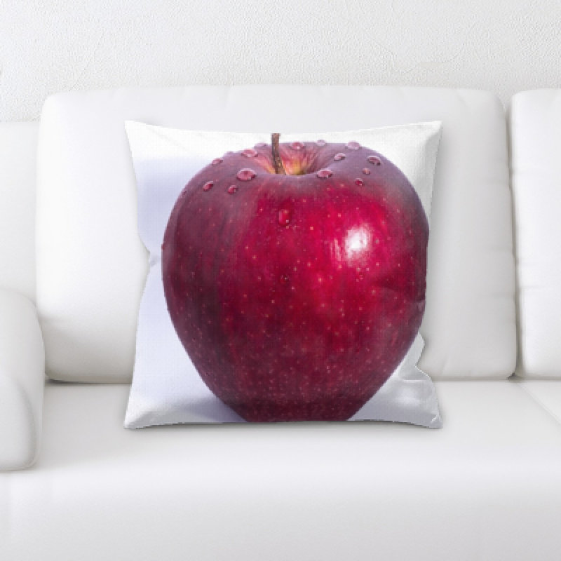 Coussin décoratif pomme sur un fond à baies fruits