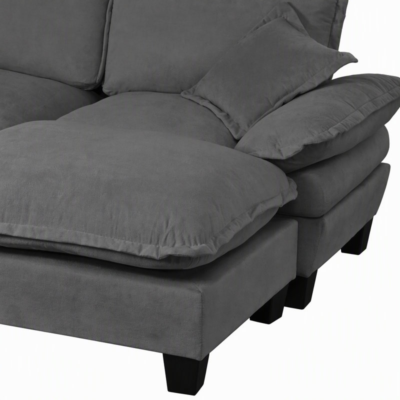 Canapé modulaire inspiré d'un voilier avec repose-pieds mobile