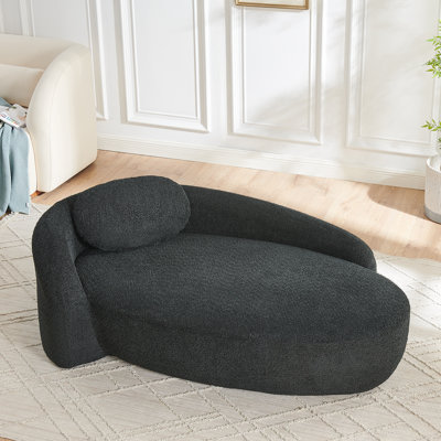 Chaise longue avec accoudoirs latéraux et coussin