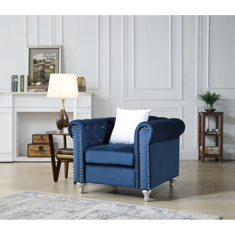 Élégant fauteuil bleu marine à accoudoirs ronds
