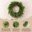 Couronne de Noël 25 po en mélange de verdure avec des pommes de pin
