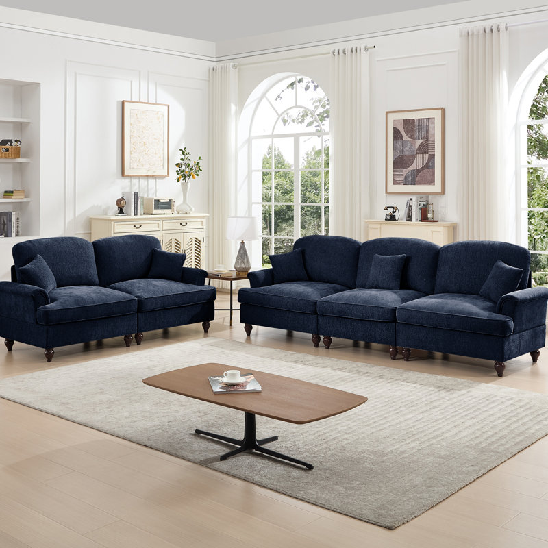 Ensemble de canapé modulaire classique 2 pièces avec accoudoirs évasés, volants amovibles et pieds fuselés, idéal pour un décor de salon polyvalent