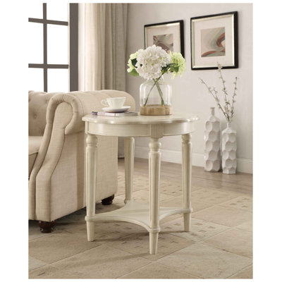 Table d'appoint ronde blanche antique avec pieds tournés et étagère inférieure