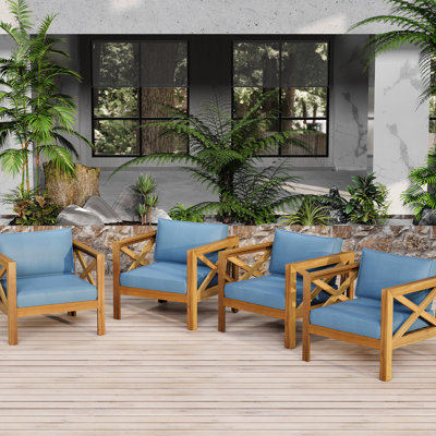 Fauteuil club d'extérieur en bois 4 pièces avec coussins en tissu imperméables bleus, finition idéale pour les terrasses en bois, idéal pour un patio