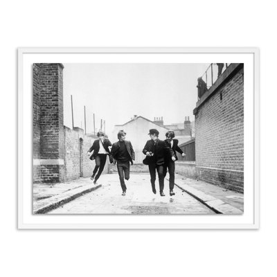 " The Beatles Running In A Hard Day's Night " by Getty Images