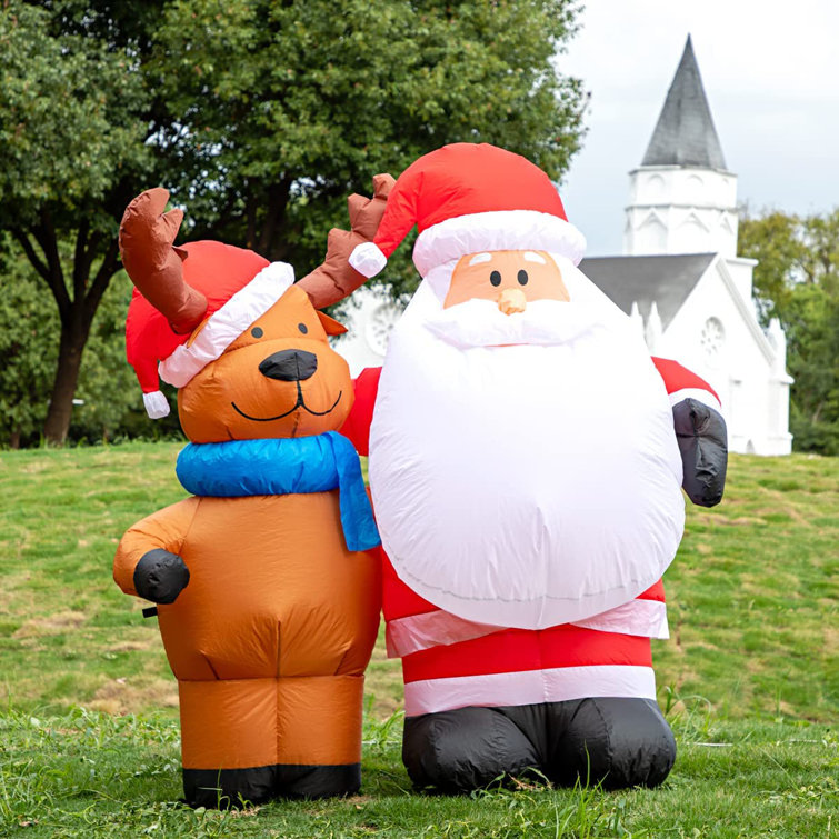 https://assets.wfcdn.com/im/47705693/resize-h755-w755%5Ecompr-r85/2247/224747693/Santa+Claus+with+Reindeer+Christmas+Outdoor+Inflatable.jpg