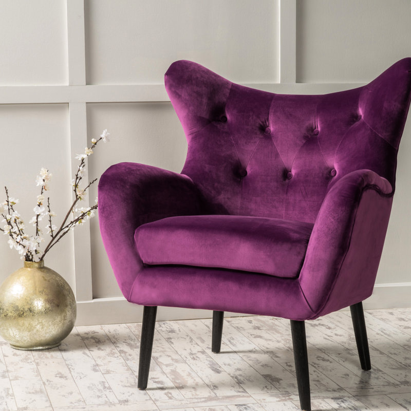 Fauteuil en velours fuchsia pour espace de vie - Chaise douce et élégante, enveloppée de chaleur et de style