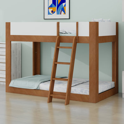 Bunk bed with reversible ladder and guardrails provides dependable construction for everyday use