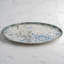 Assiette ovale en porcelaine et titane Cruise-Palma Premium avec pied, 31,75 cm