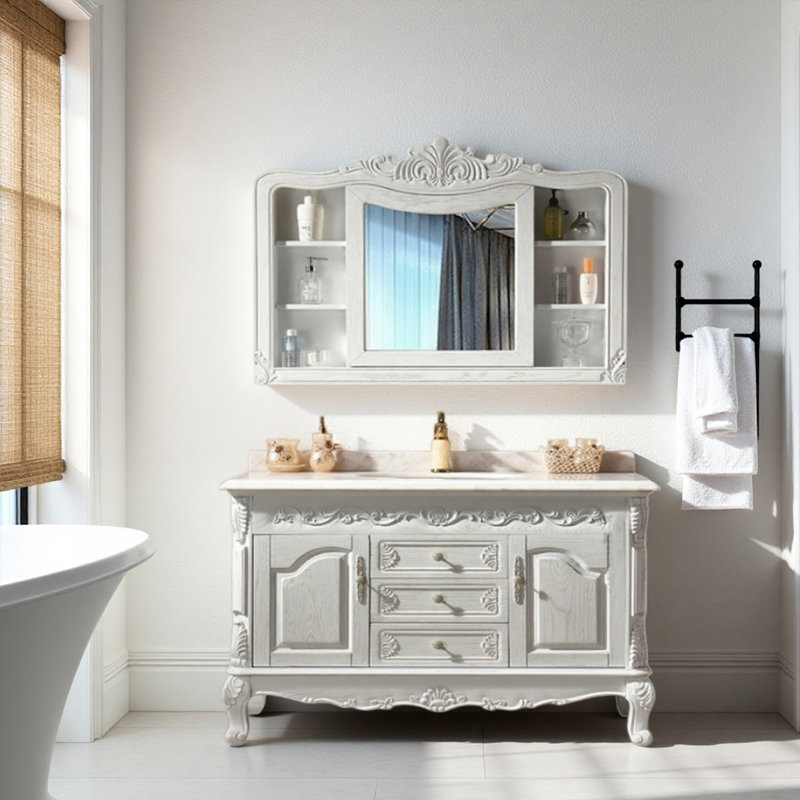 Meuble-lavabo sculpté en chêne de style européen avec plateau en marbre