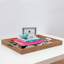 Plateau de table basse/repose-pieds rose dissimulé